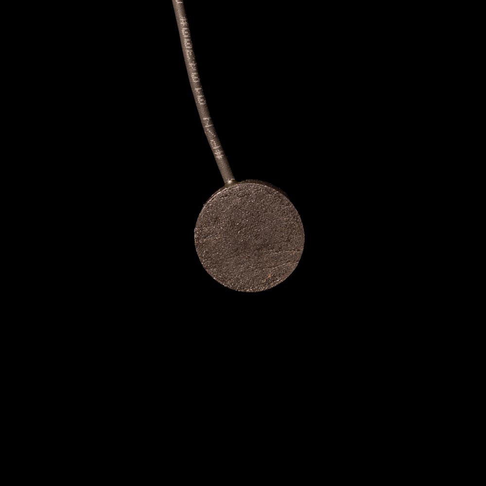 The tailored sound receiver, a small contact sensor on a thin cable